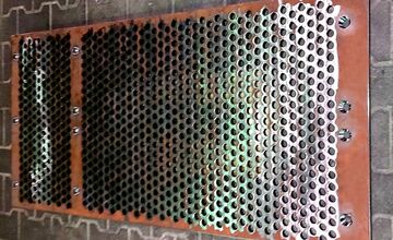 Production of perforated plates made of HARDOX for recycling plants